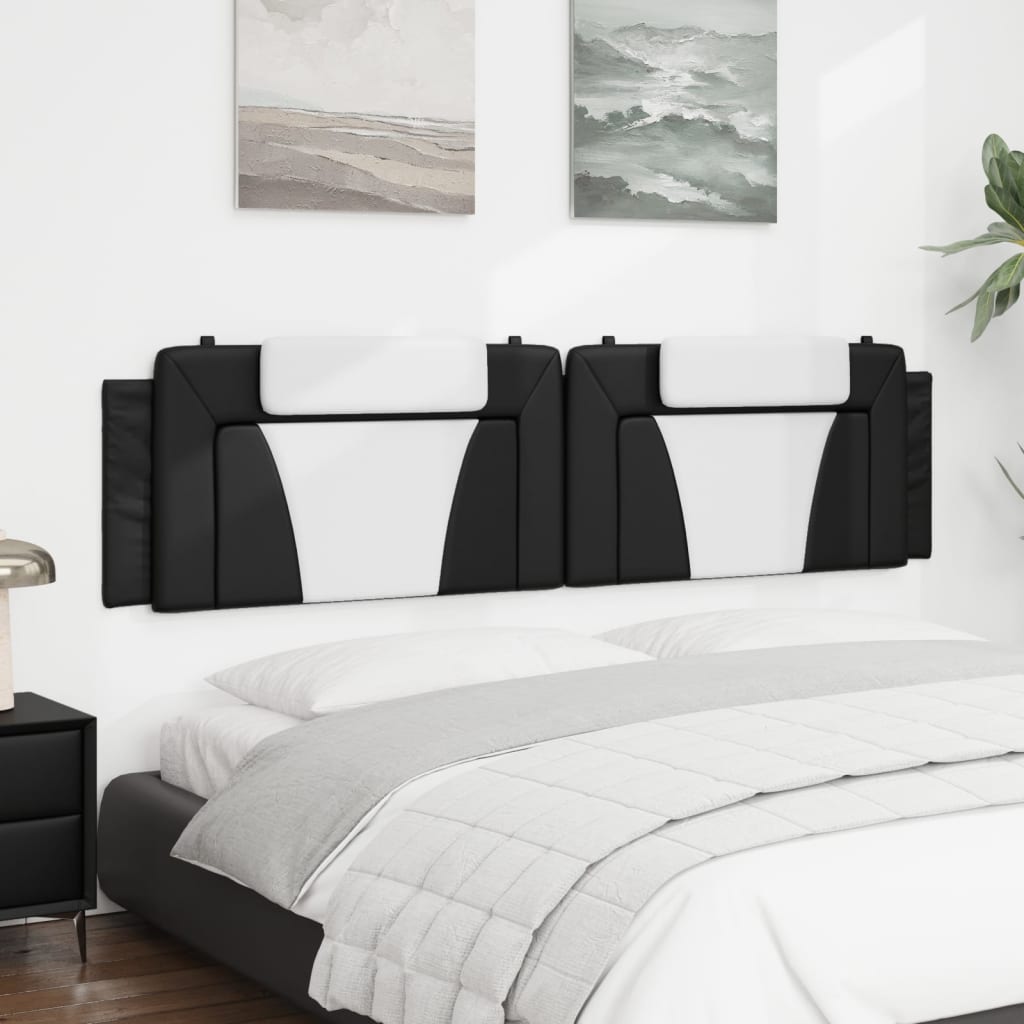 Black and white faux leather king size bed with integrated headboard