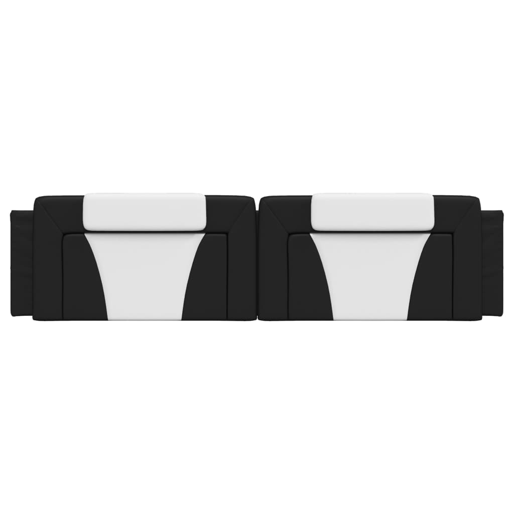 Modular black and white faux leather headboard with cushioned panels