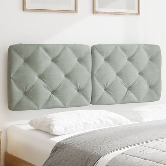 Two sage green upholstered headboard panels with diamond tufting