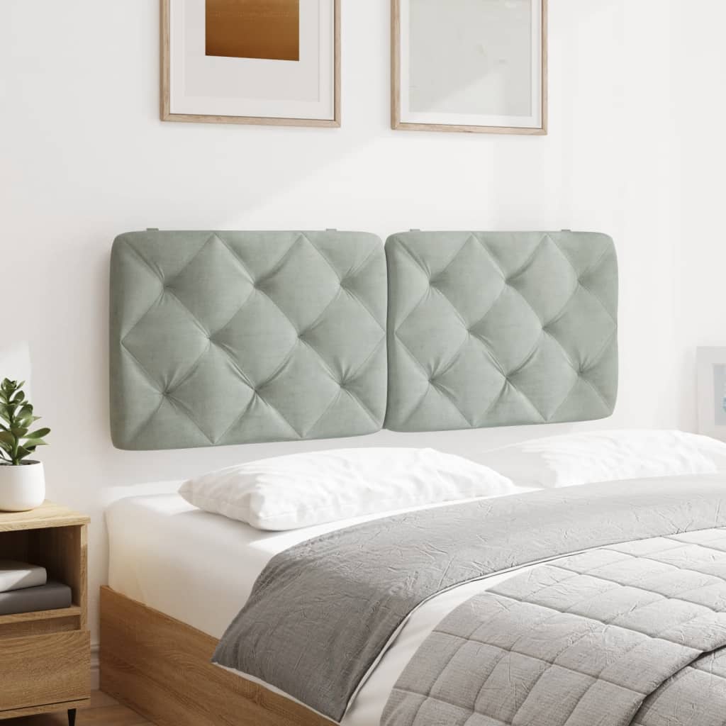 Light blue tufted velvet headboard for a kingsize bed