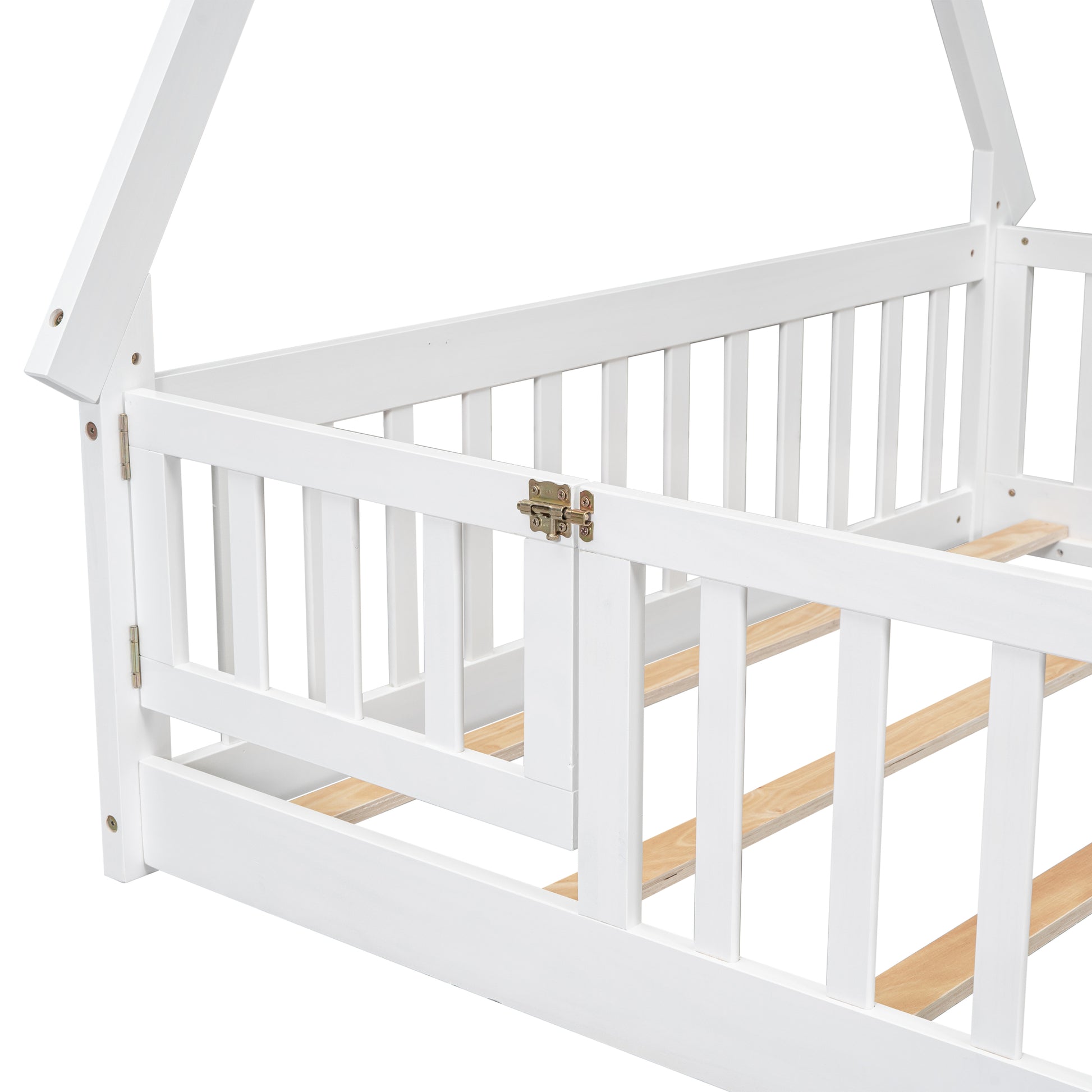 White wooden house bed frame detail with safety rails and latch