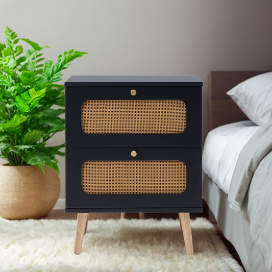 Black twodrawer nightstand with cane detailing and gold knobs