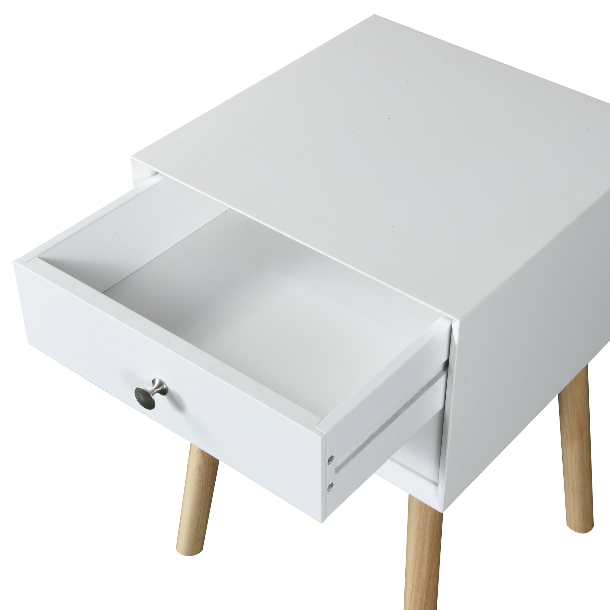 White bedside table with a single drawer and tapered wooden legs