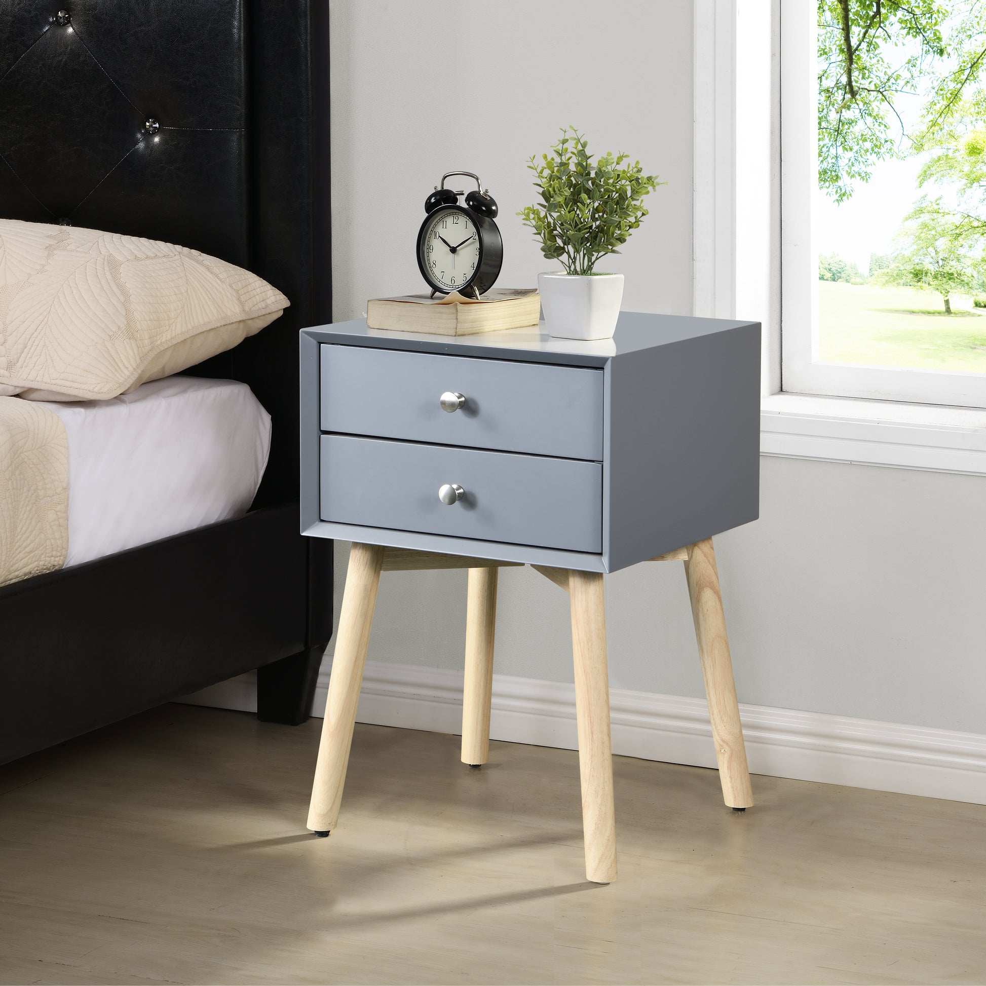 Gray twodrawer nightstand with wood legs and silver knobs