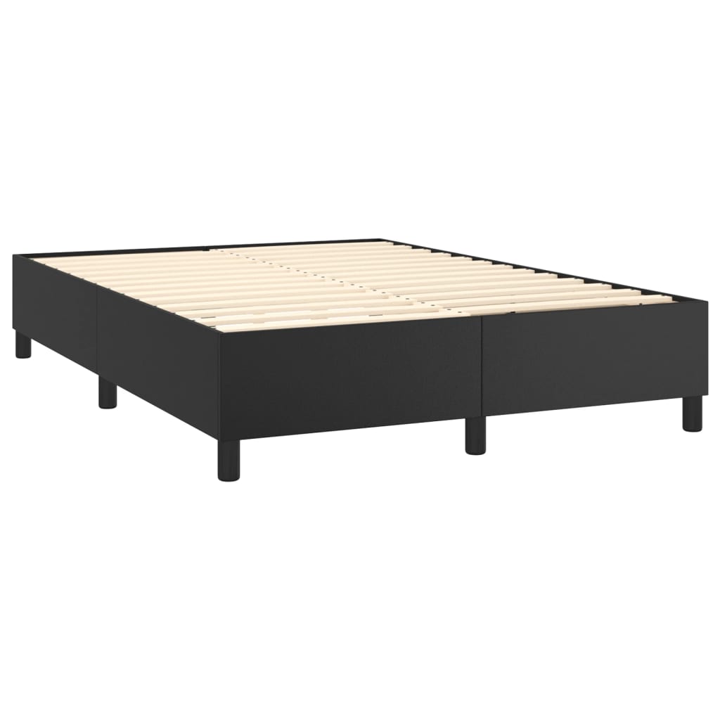 Black upholstered box spring bed frame with white mattress