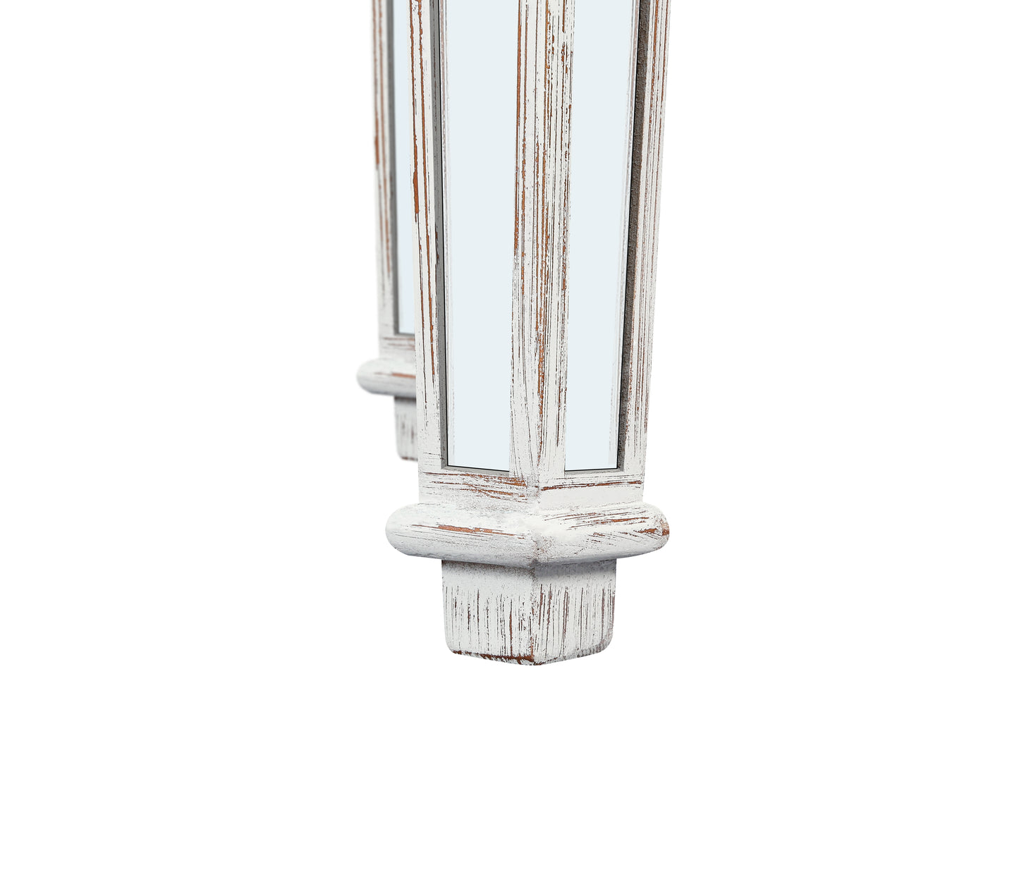 Distressed white wooden legs of a table with mirrored inlays