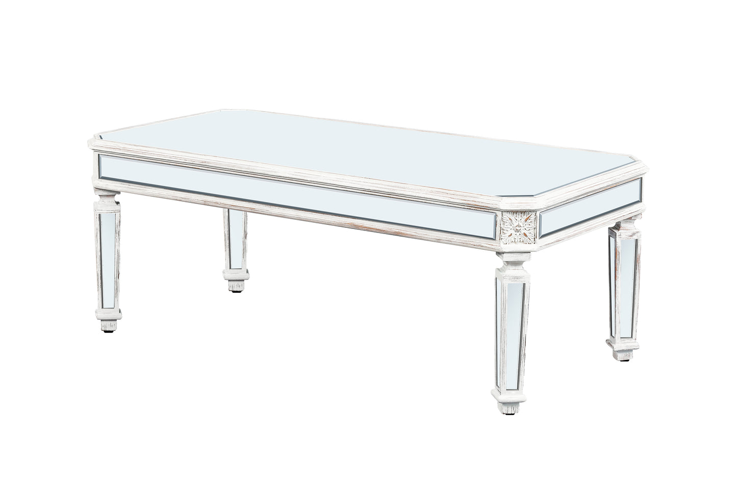 White distressed mirrored coffee table with ornate carved details and a rectangular glass top