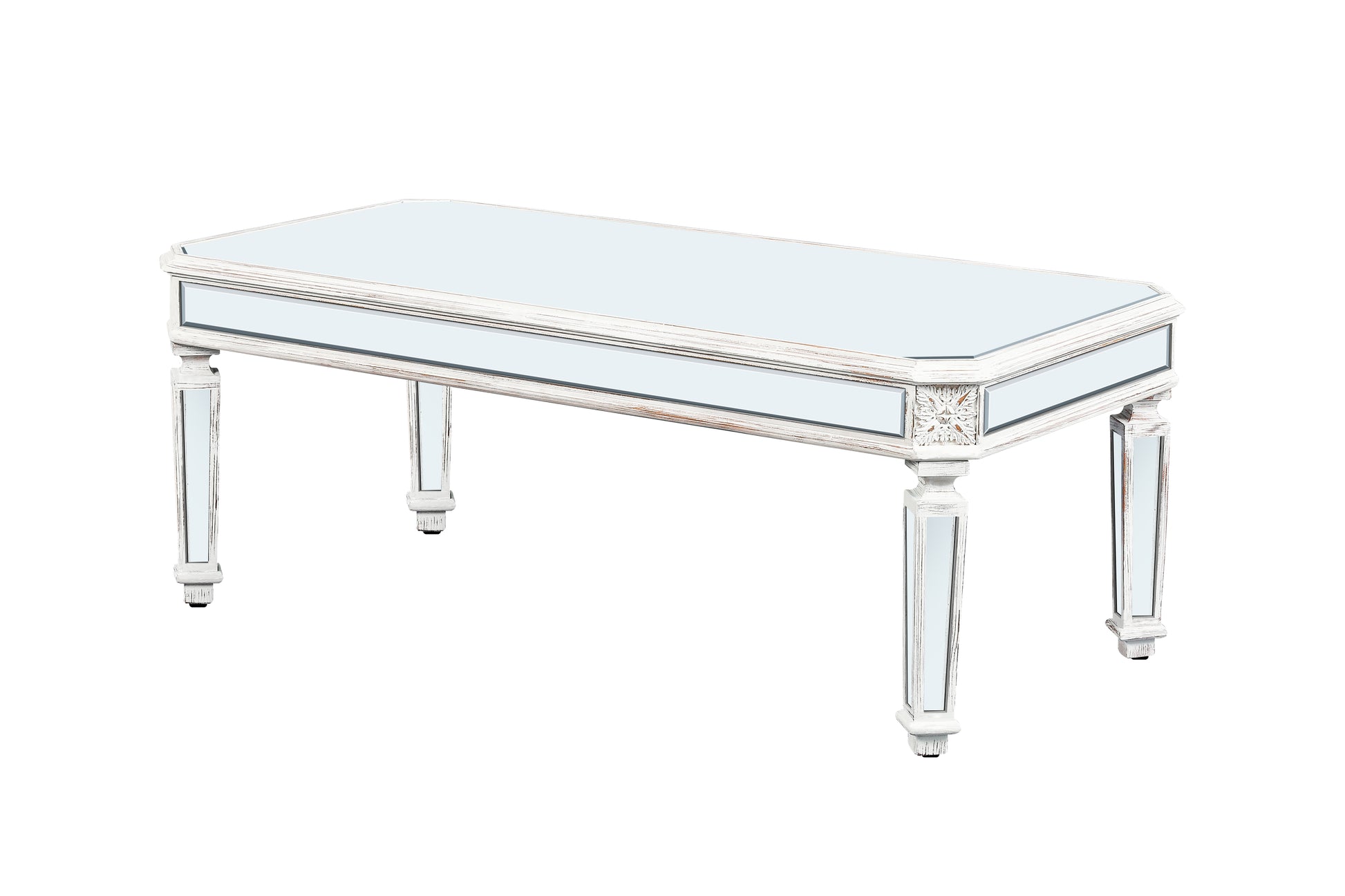 White distressed mirrored coffee table with ornate carved details and a rectangular glass top