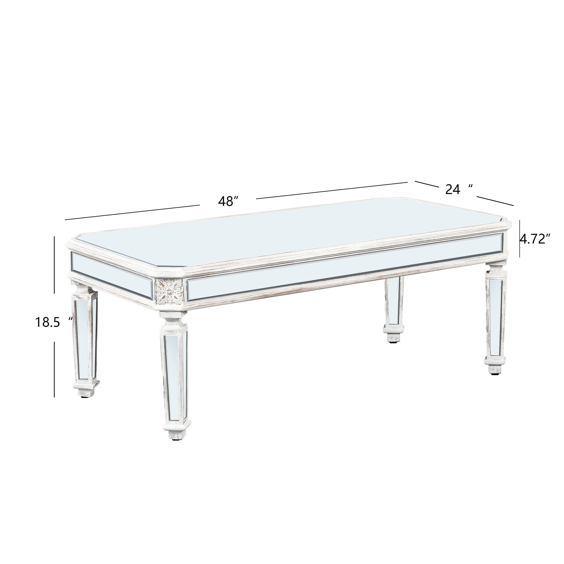 Ornate mirrored coffee table with distressed white finish and carved details perfect for a vintage living room