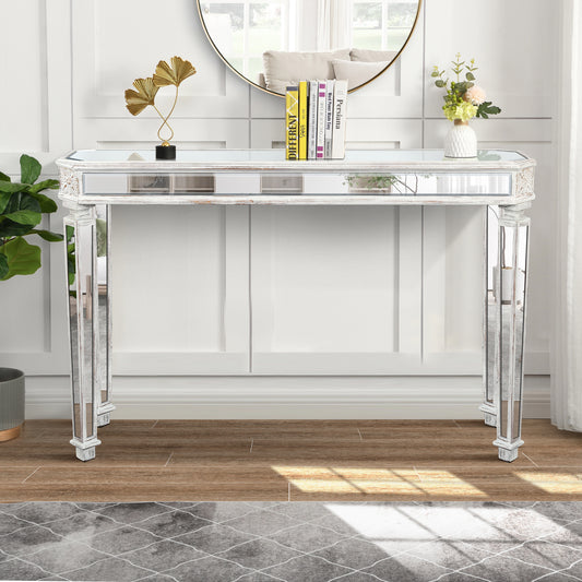 Mirrored white console table with ornate detailing and octagonal glass top