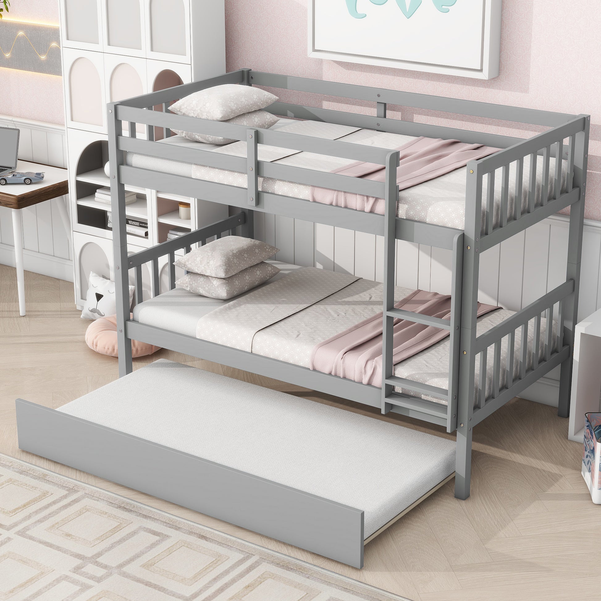 Gray wooden twin over twin bunk bed with trundle