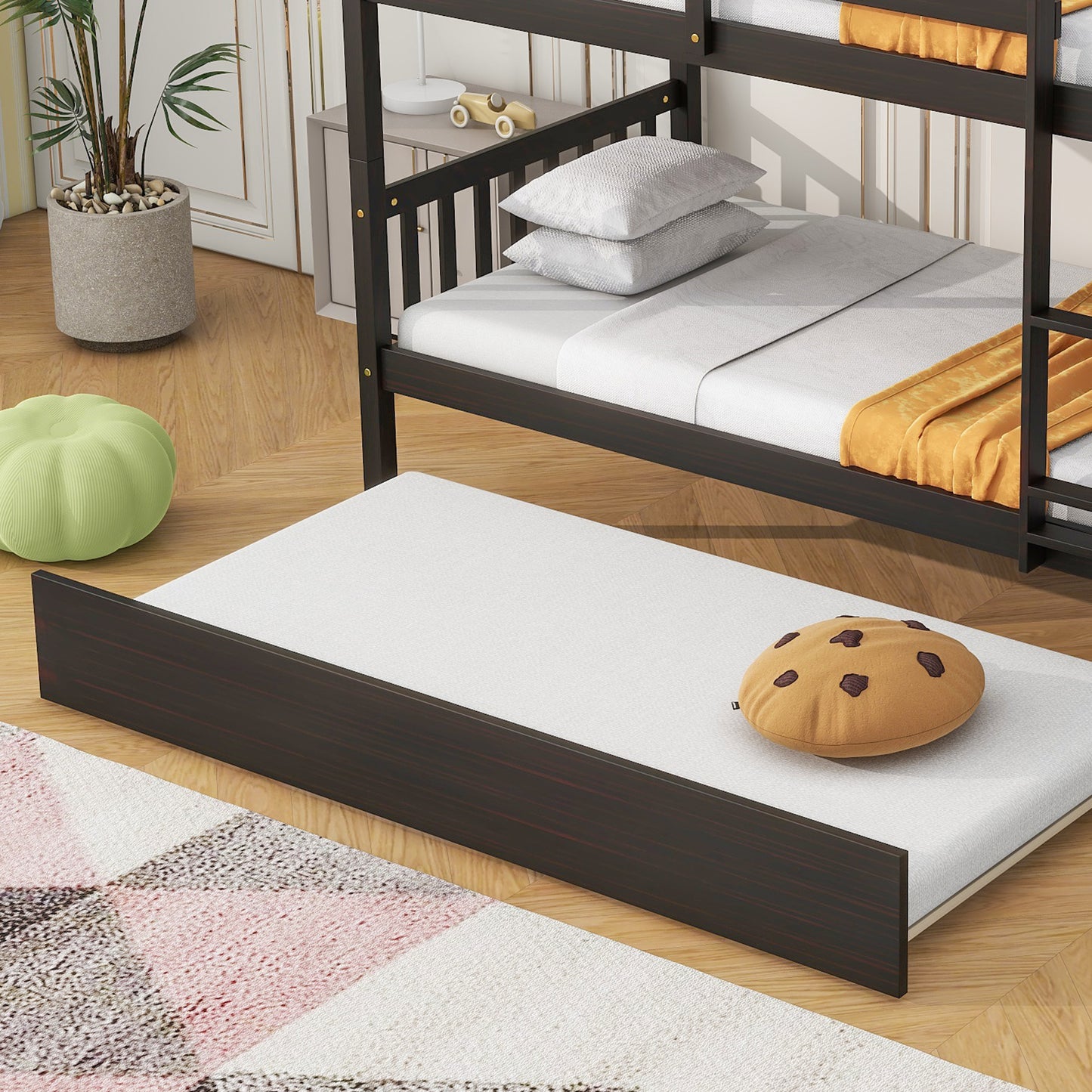 Dark wood twin bunk bed with pullout trundle