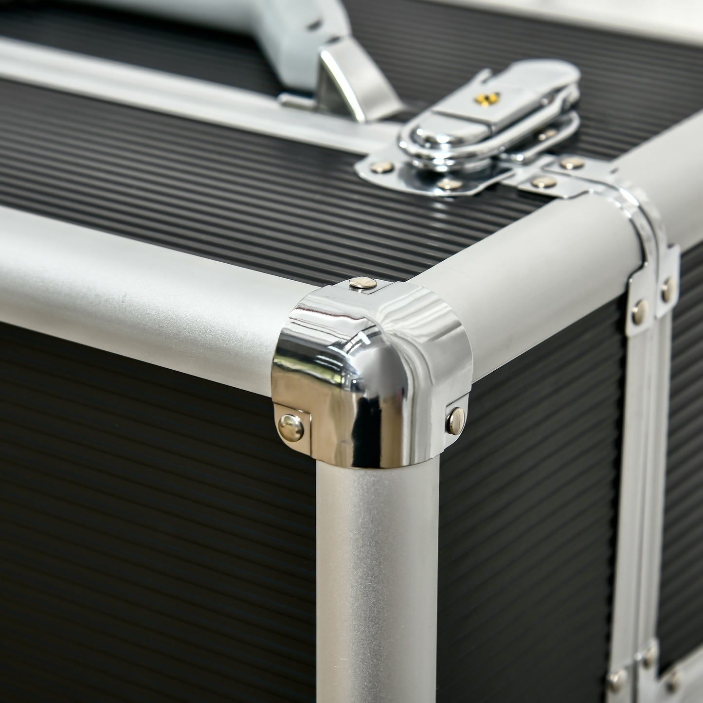 Black aluminum case with silver trim and chrome latch
