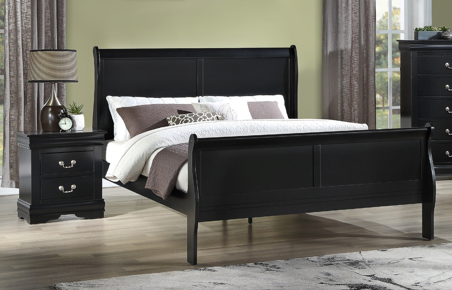 Black wooden sleigh bed with white and brown bedding