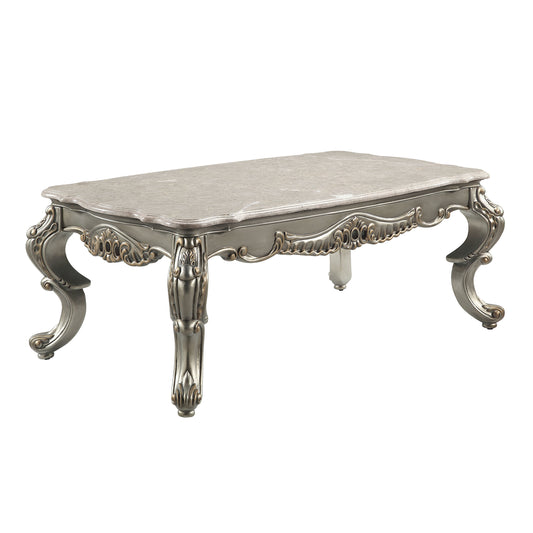 Ornate marble top coffee table with silver carved legs