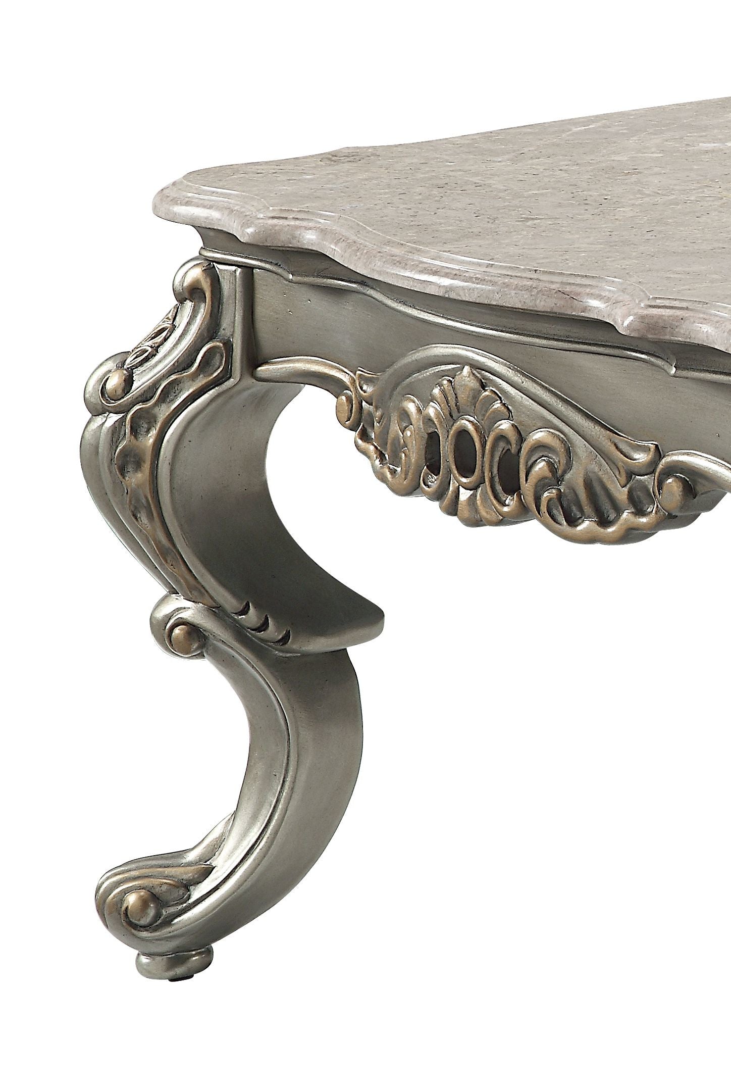 Ornate carved silver accent table leg with marble top detail