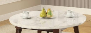 Round marble coffee table with dark wooden legs