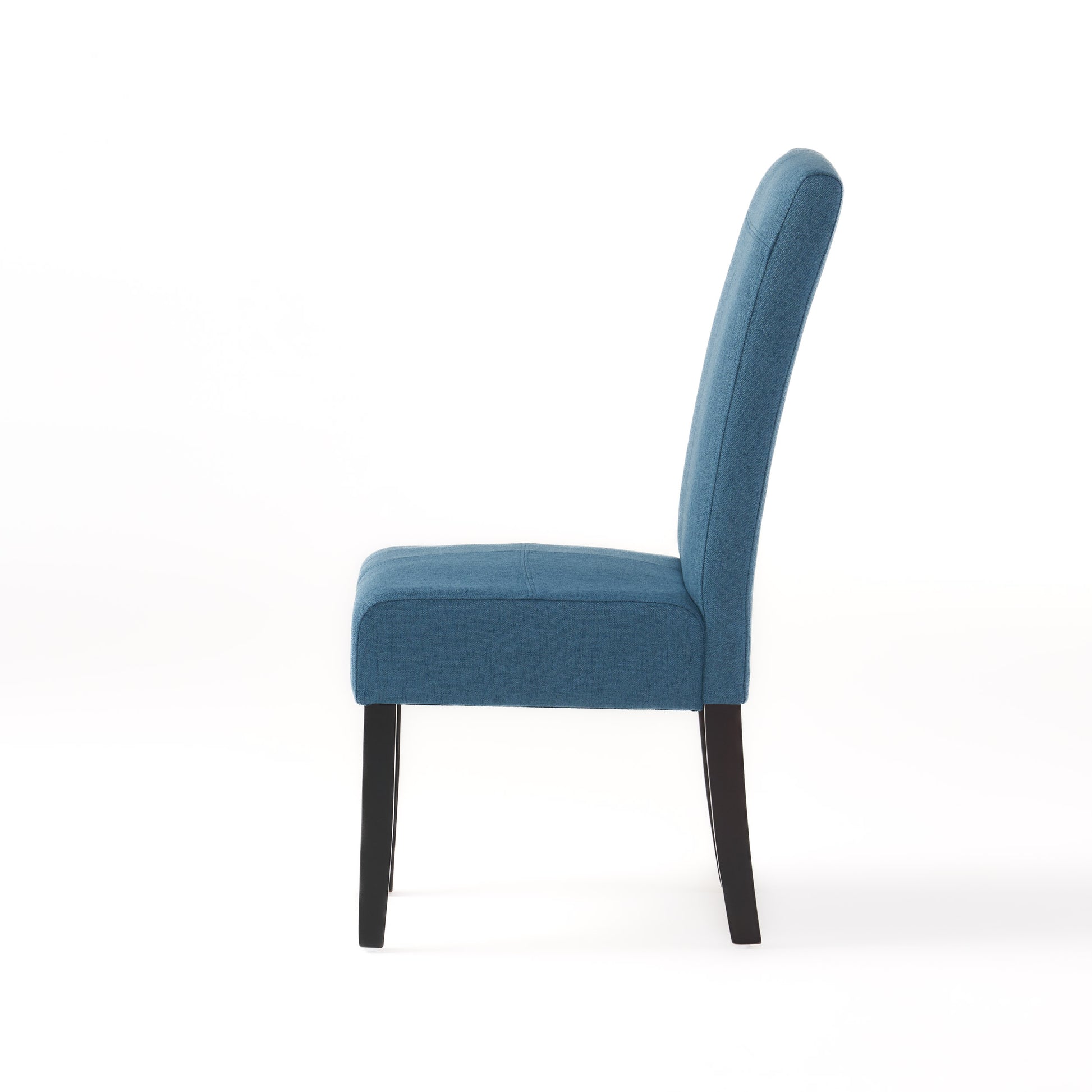 Side view of a blue upholstered dining chair with wooden legs
