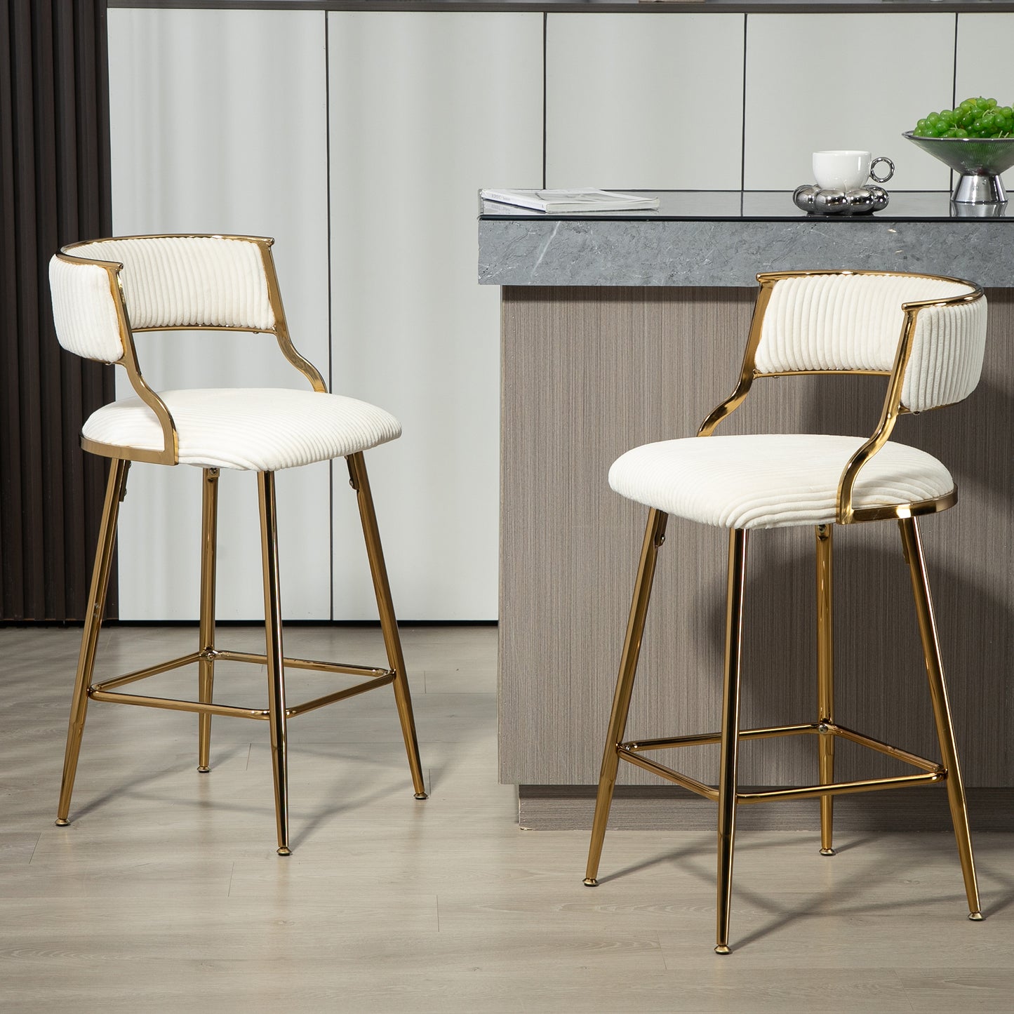 White corduroy bar stool with gold metal legs and frame