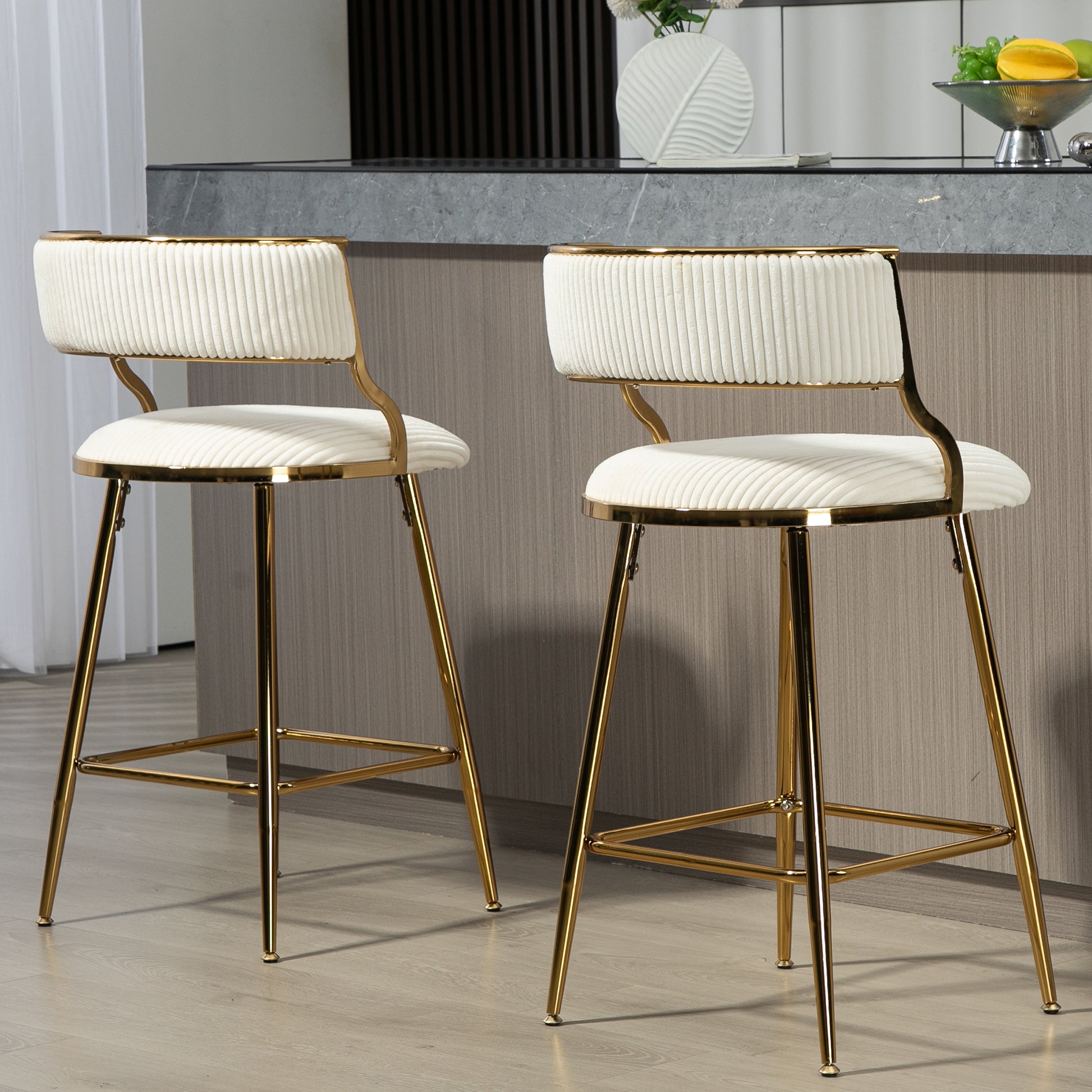 Cream corduroy bar stool with gold metal legs and curved backrest