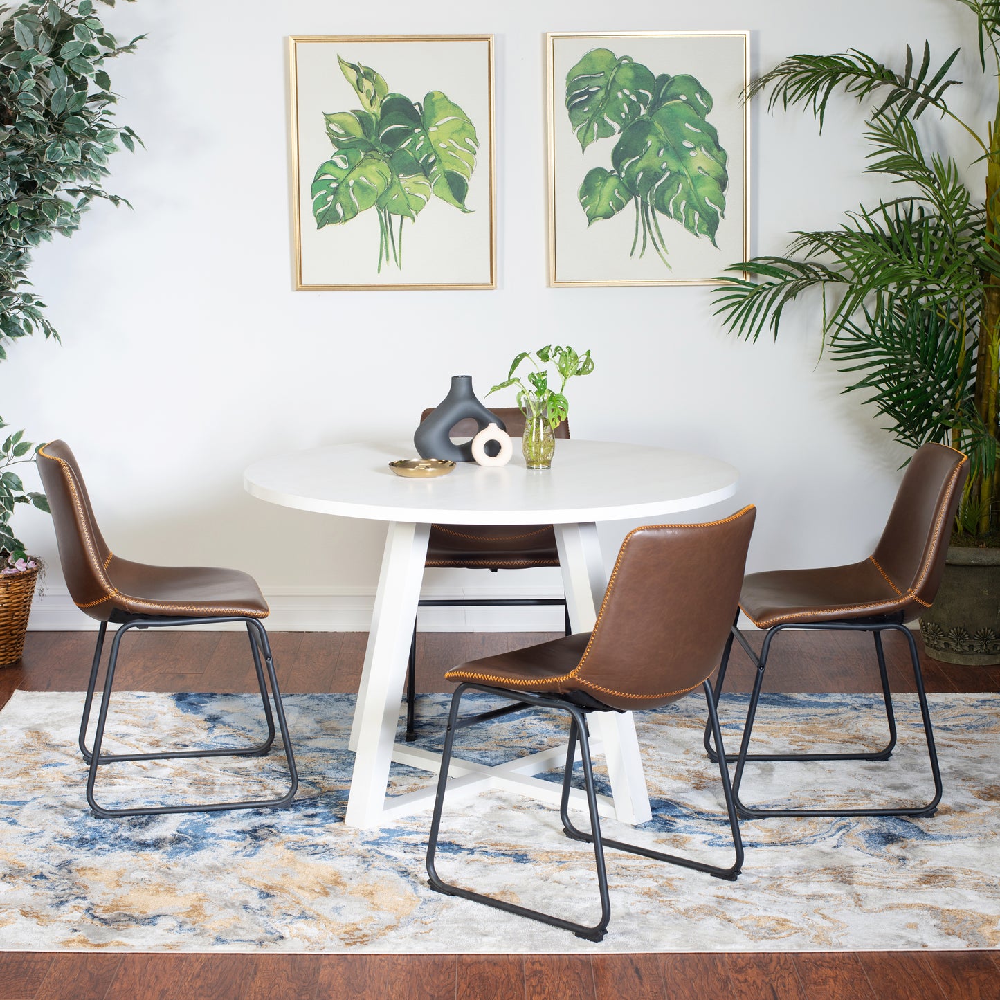 Brown faux leather dining chair with orange stitching and black metal legs