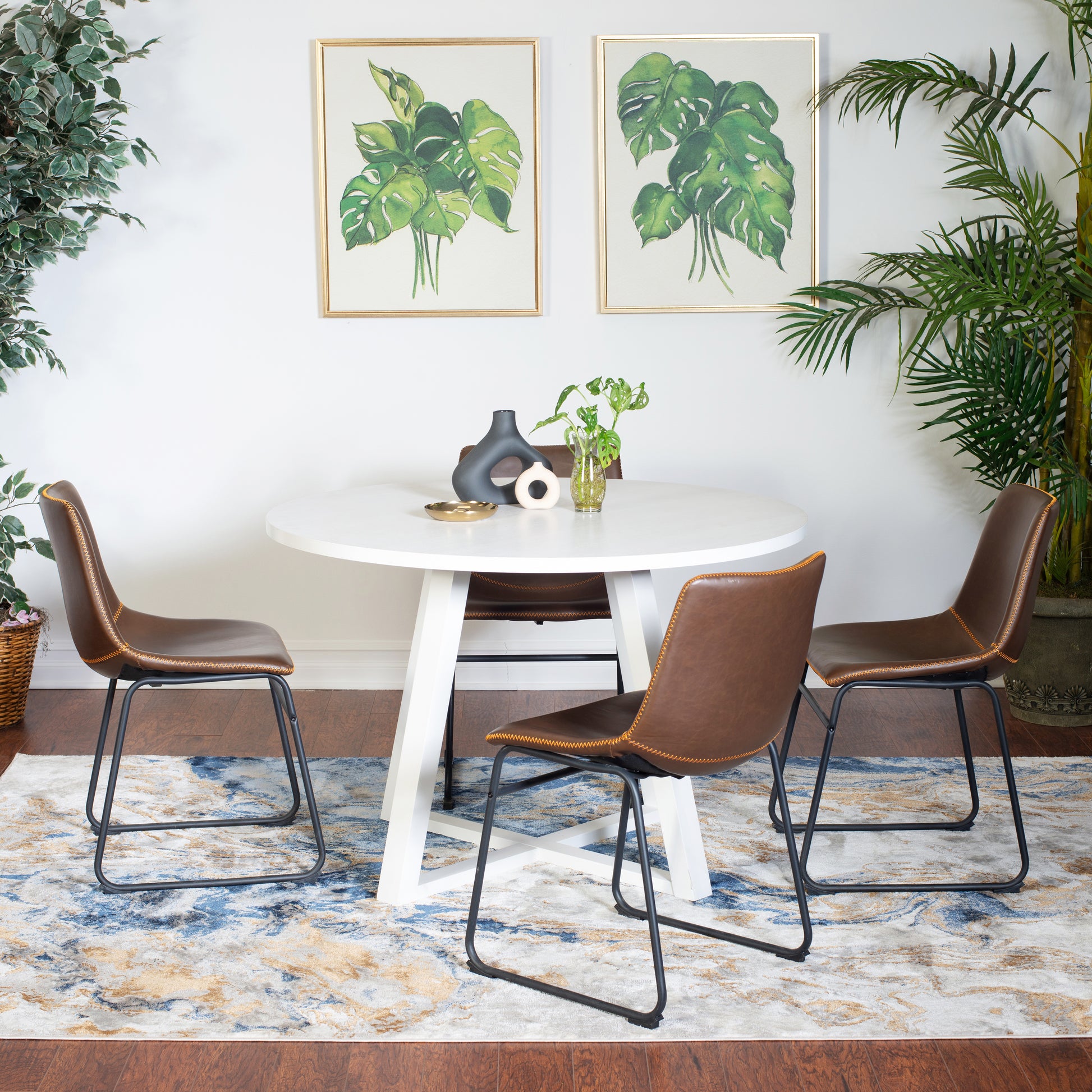 Brown faux leather dining chair with orange stitching and black metal legs