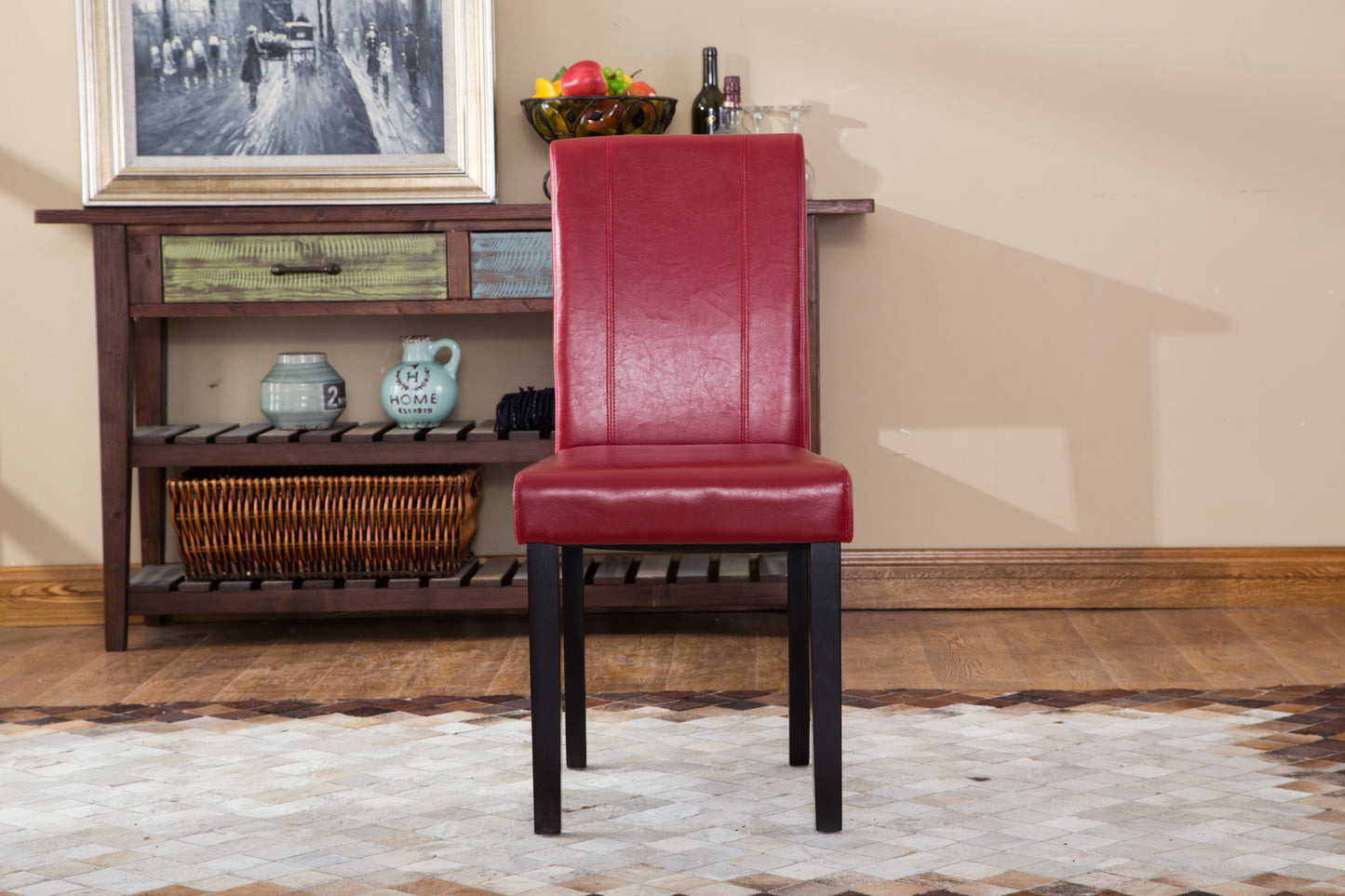 Red faux leather dining chair with stitched detailing and black wooden legs