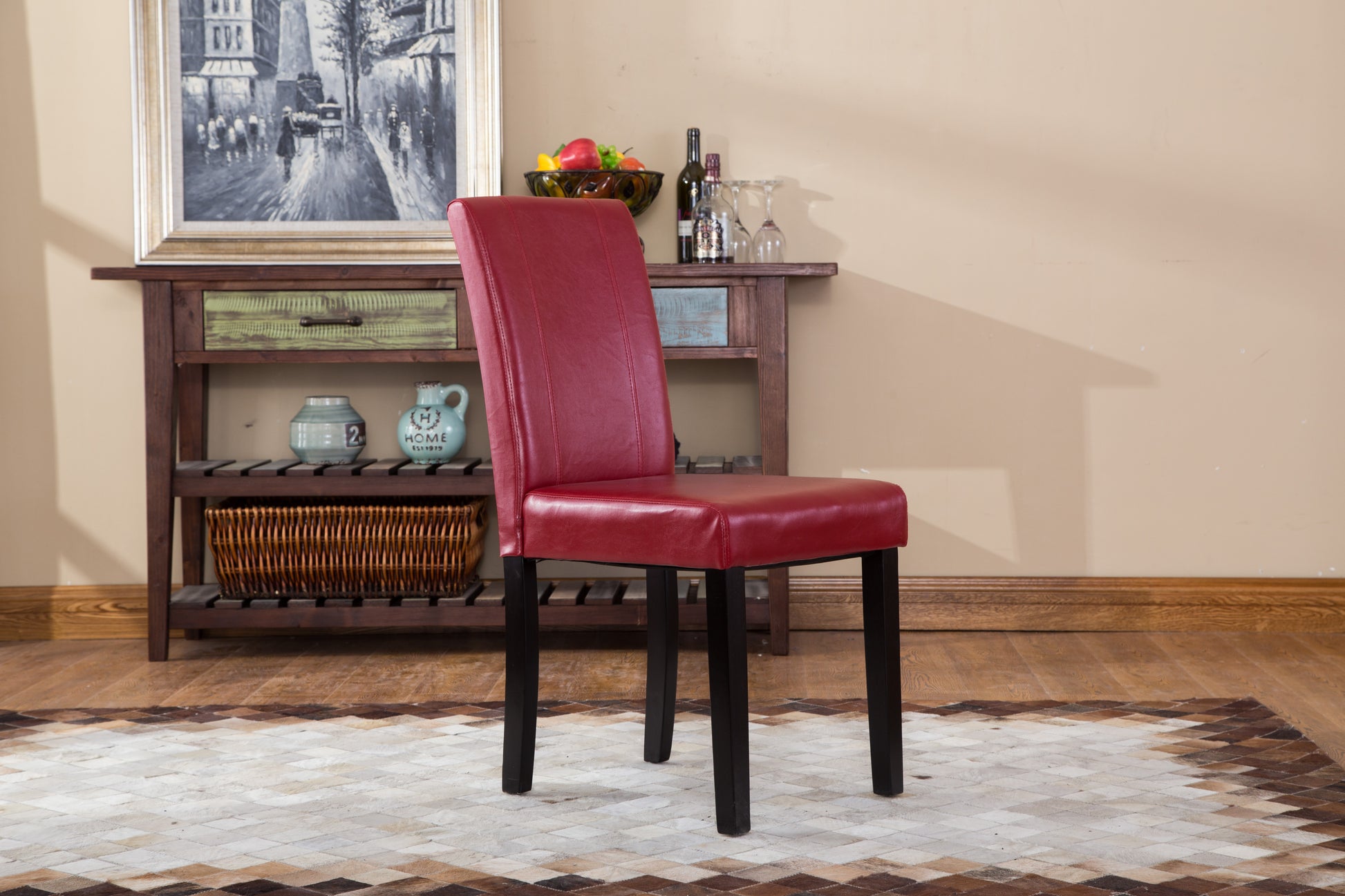 Red upholstered dining chair with dark wood legs