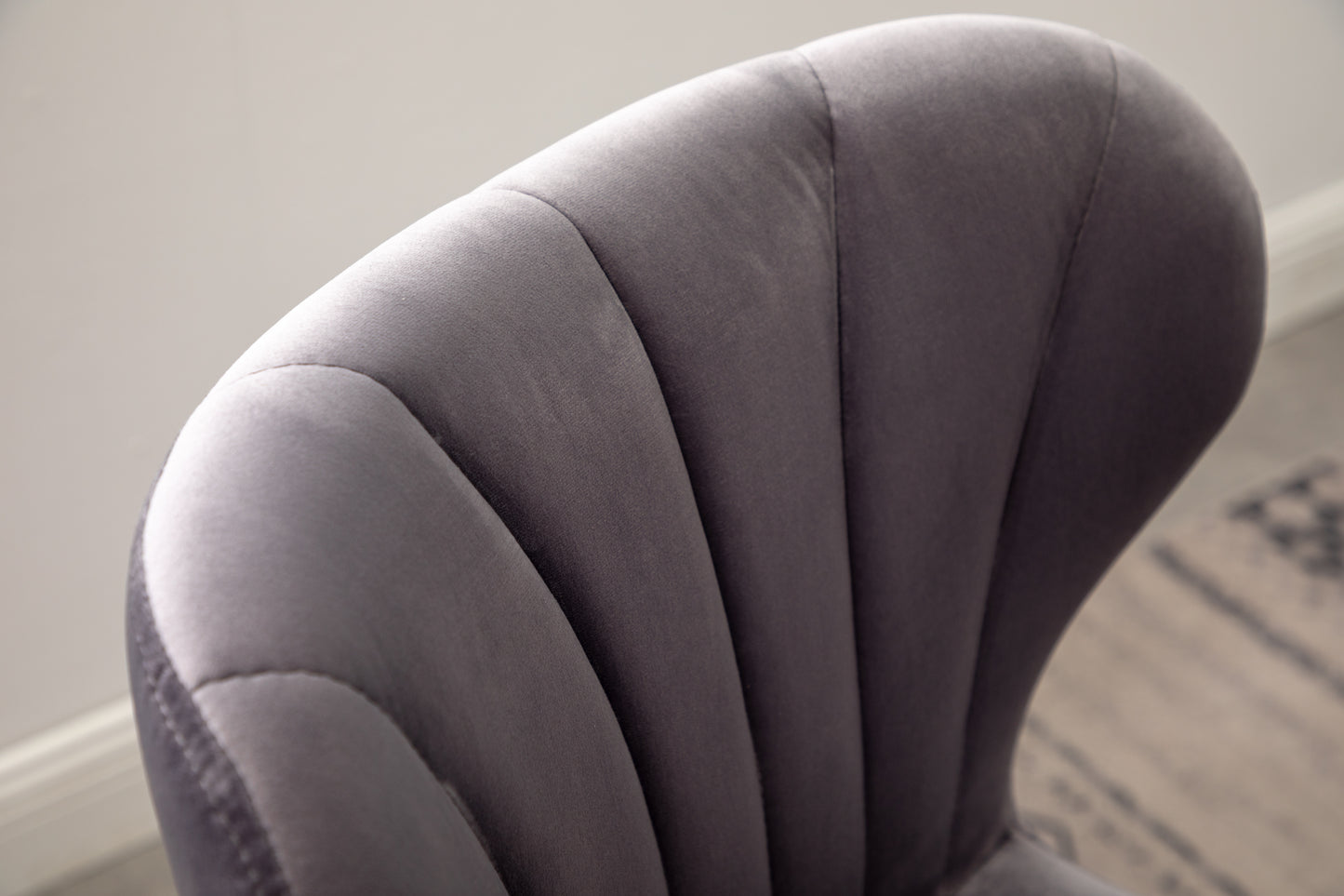 Gray velvet accent chair with channel tufting
