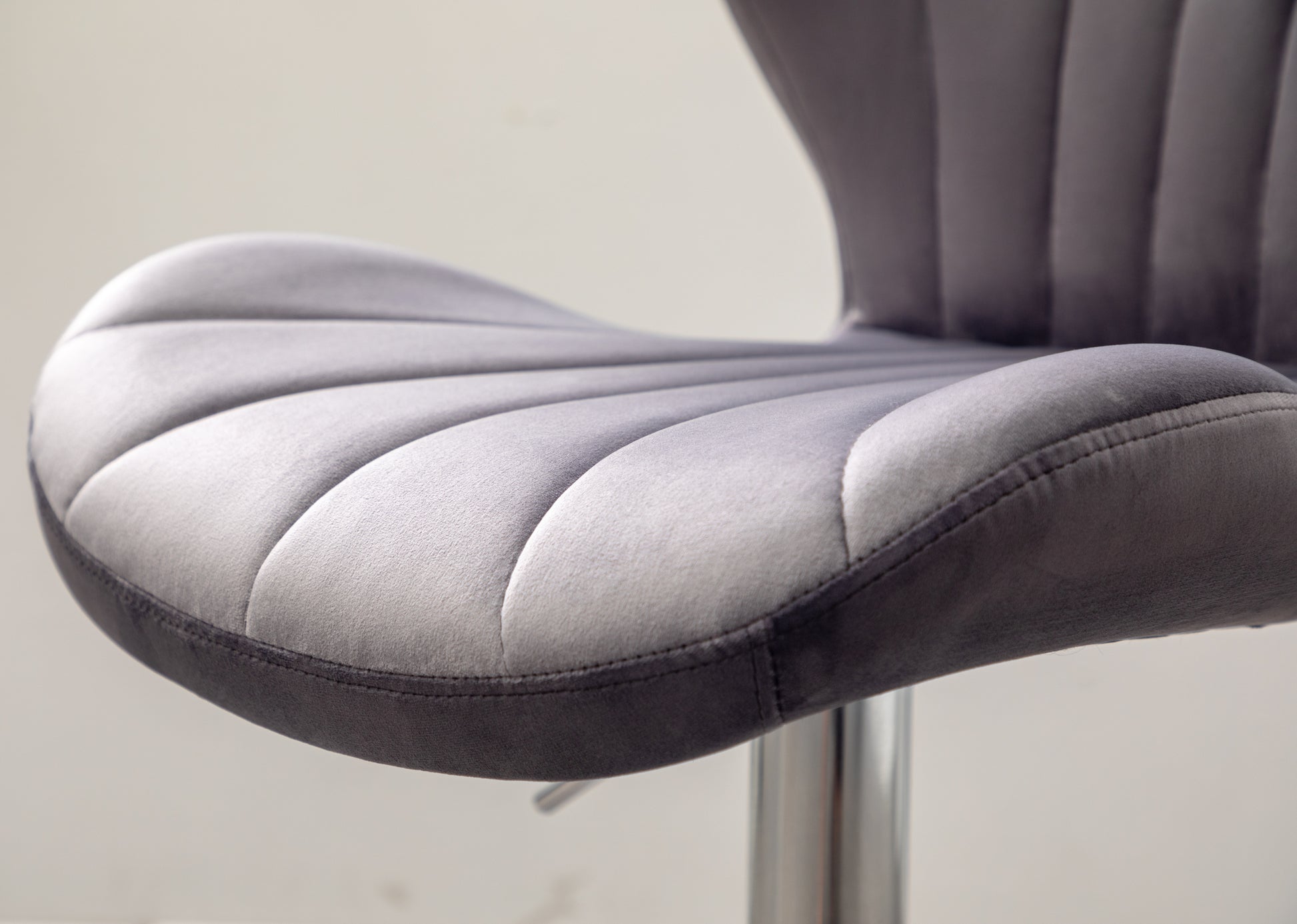 Gray velvet tufted counter stool seat with chrome base