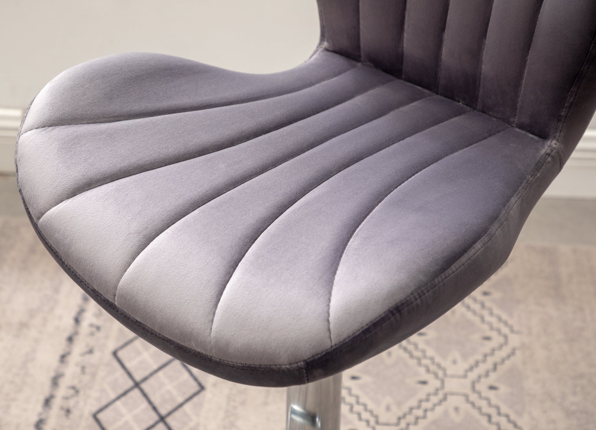 Gray velvet dining chair seat with channel tufting