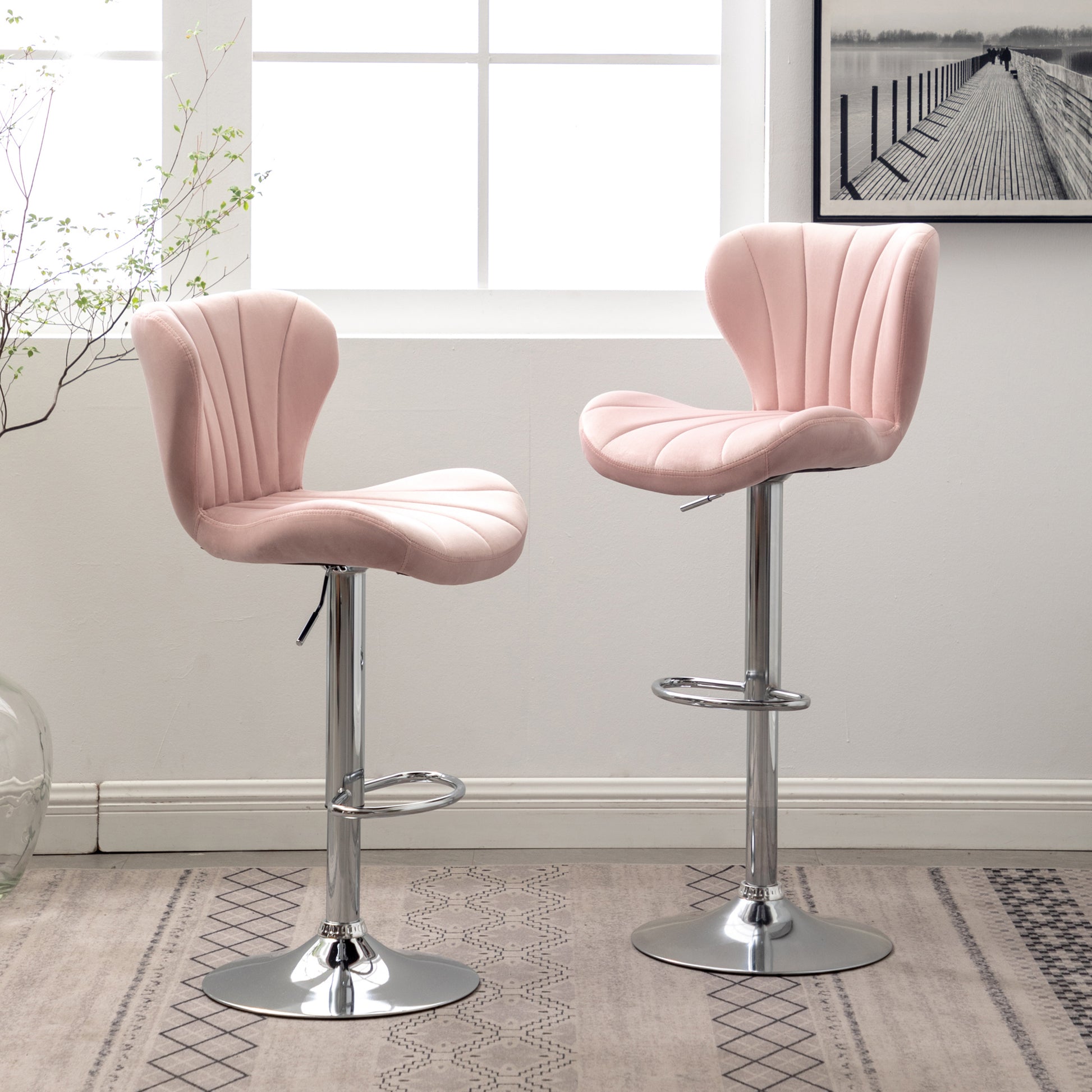 Pink velvet bar stool with fluted backrest and chrome base