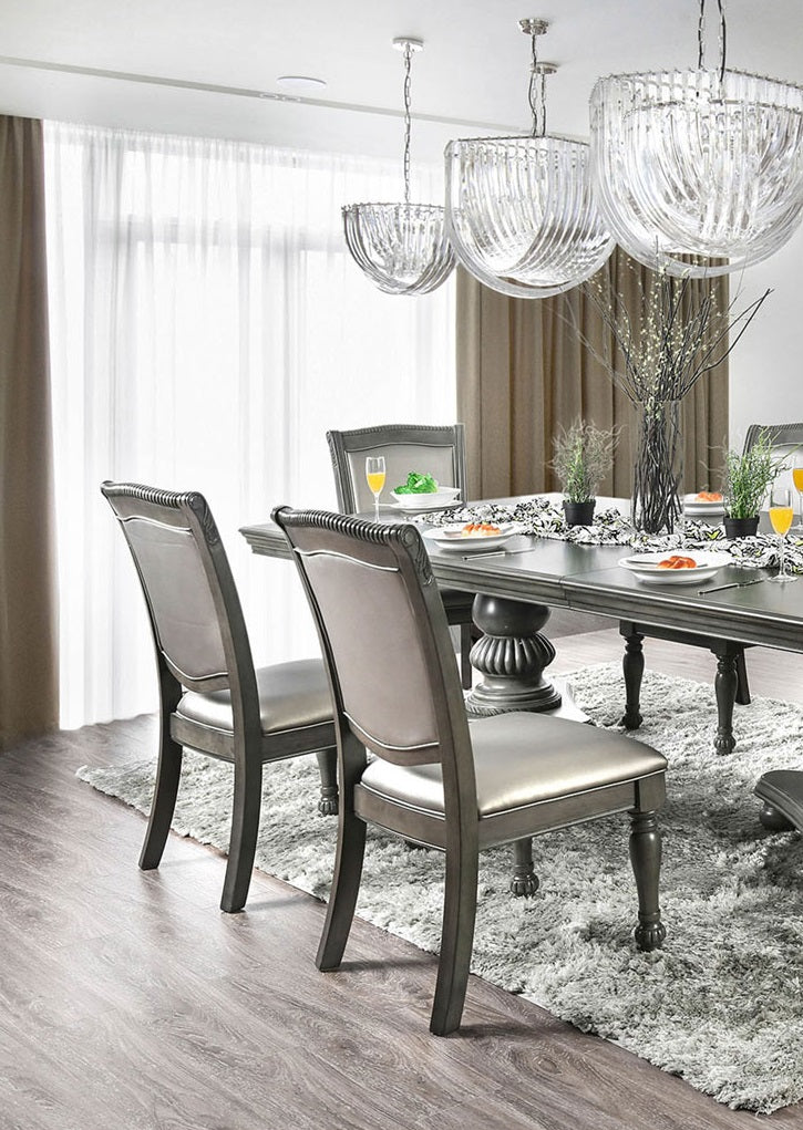 Upholstered dining chairs with dark wood frames and silver accents