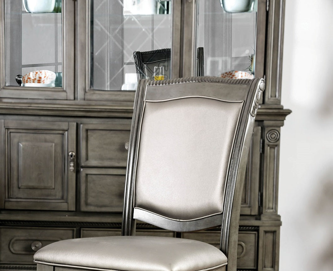 Elegant upholstered dining chair with intricate wood trim details