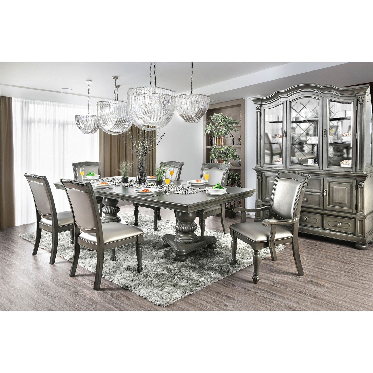 Elegant dining table set with upholstered chairs and matching china cabinet