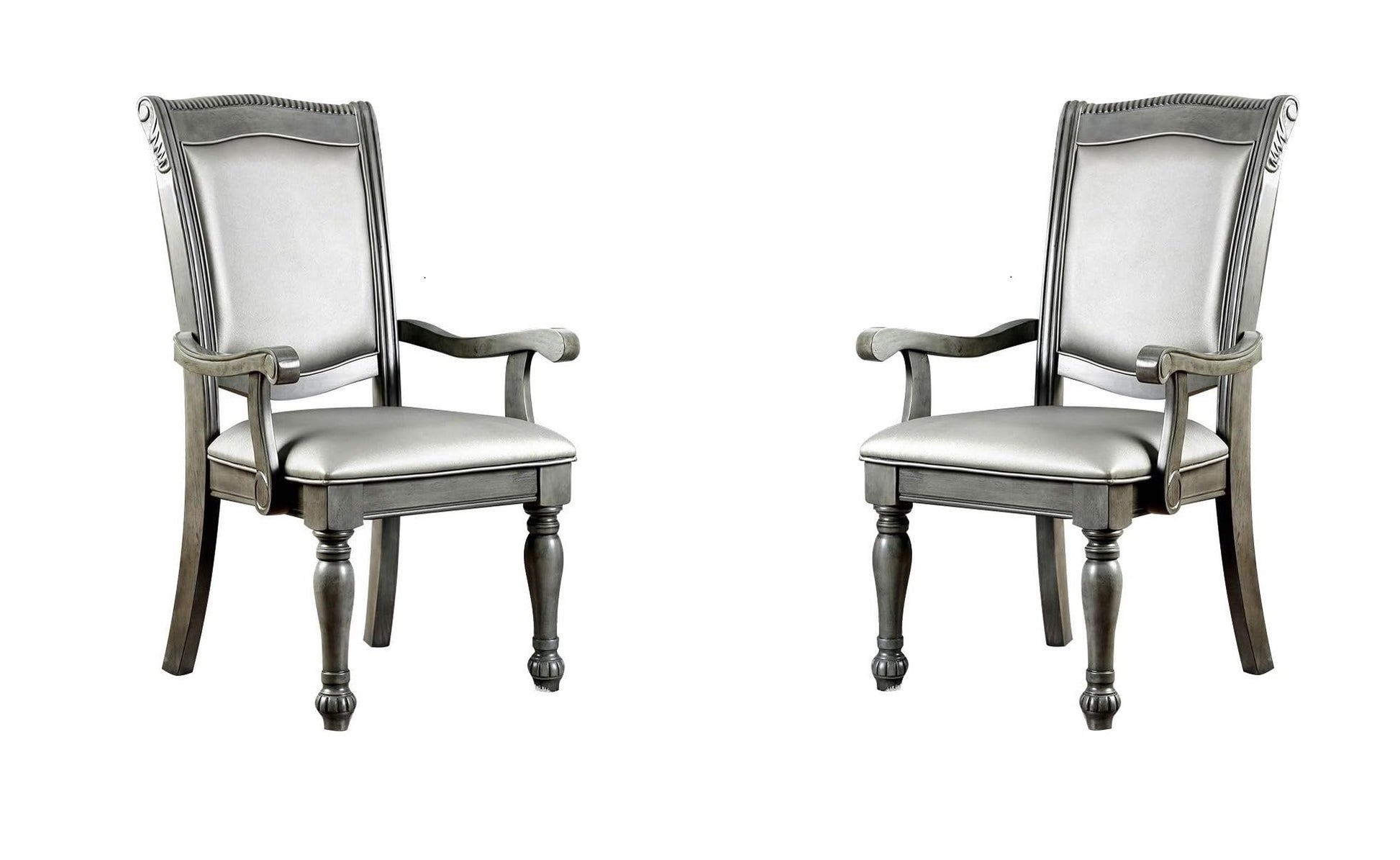 Gray upholstered dining chair with carved wood details