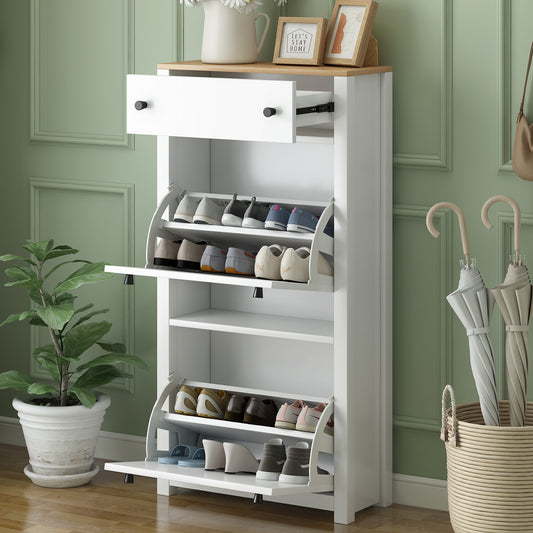 White shoe cabinet with wood top and one drawer storing various shoes