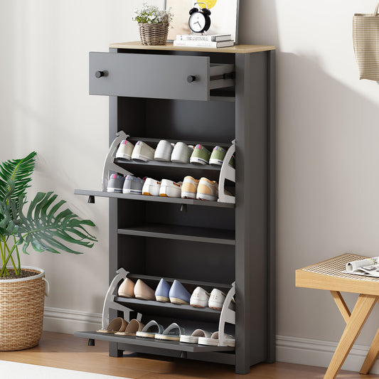 Gray entryway shoe cabinet with angled shelves holding various shoes