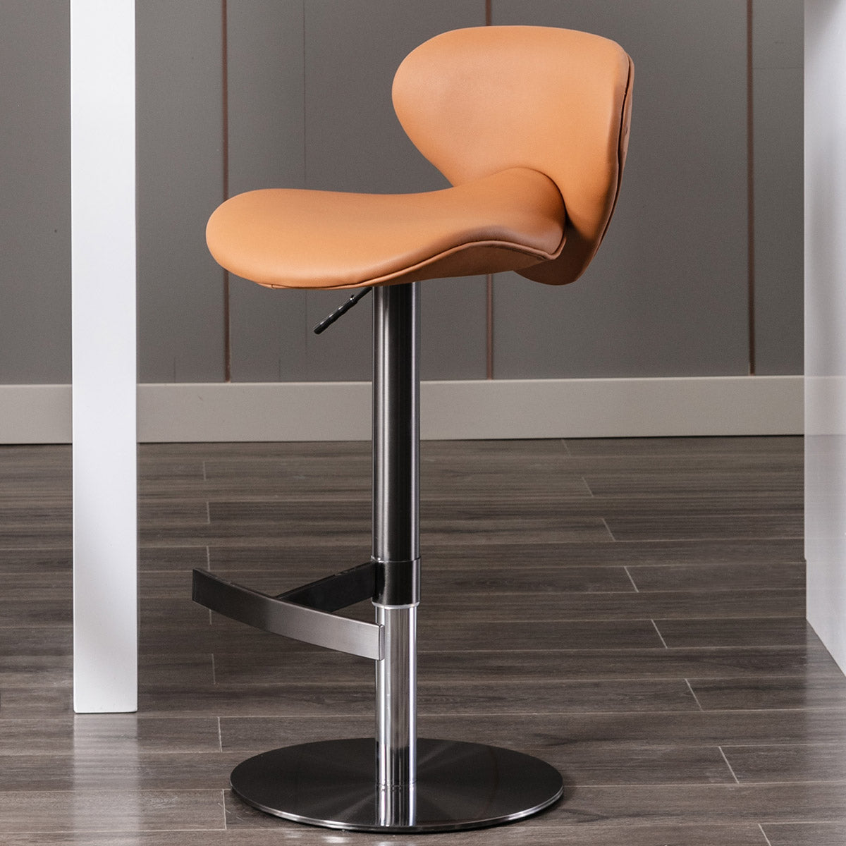 Tan faux leather adjustable height bar stool with chrome base