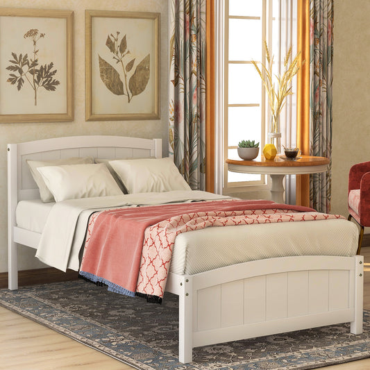White wooden twin bed with ivory bedding and a coral throw