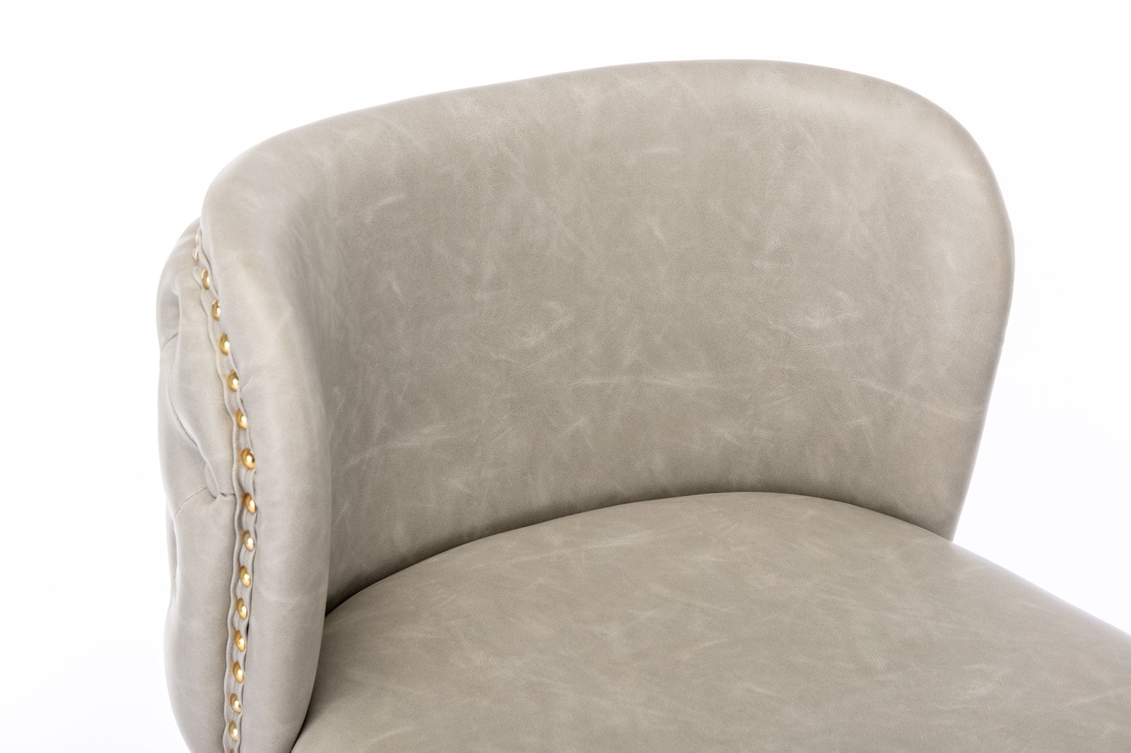 Light gray faux leather bar stool back with brass stud detail