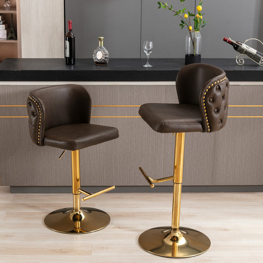 Brown leather bar stool with tufted back and gold pedestal