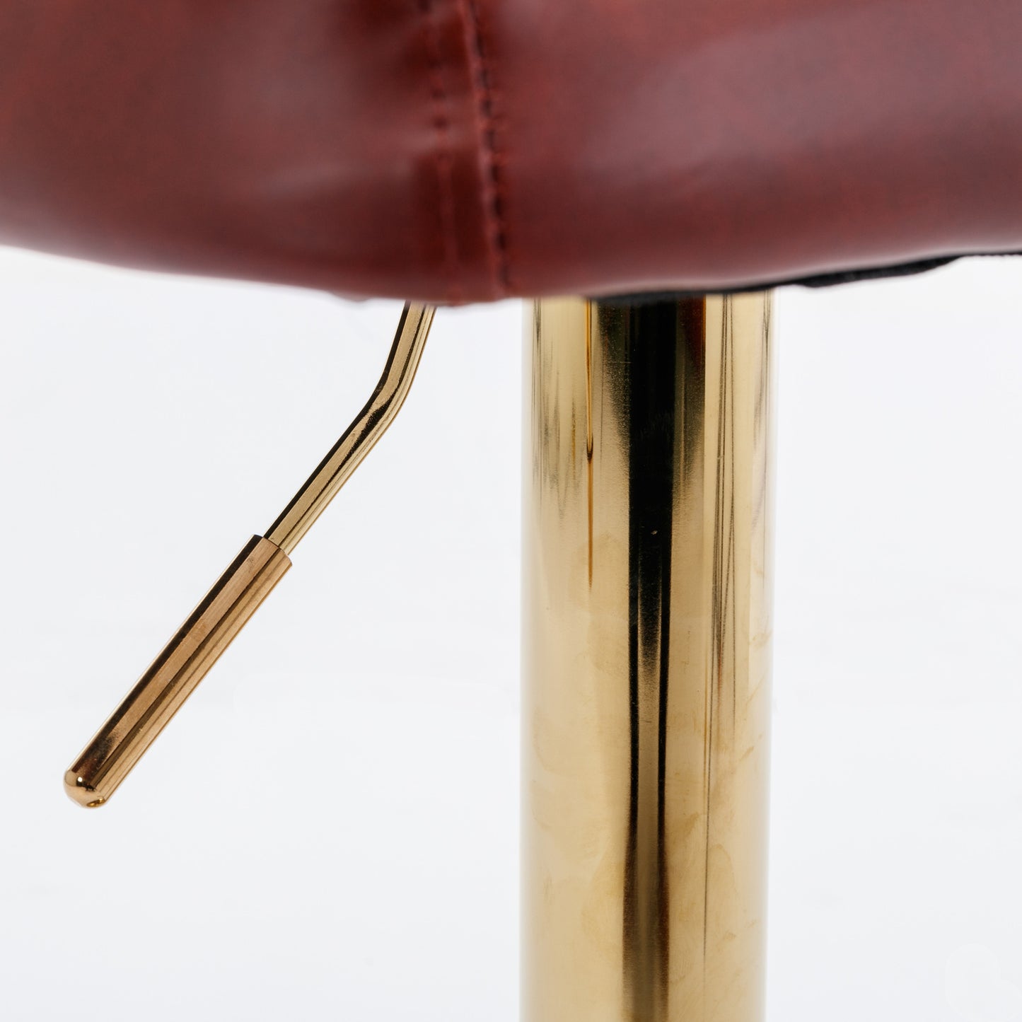 Adjustable height bar stool with rich brown faux leather and polished gold pedestal