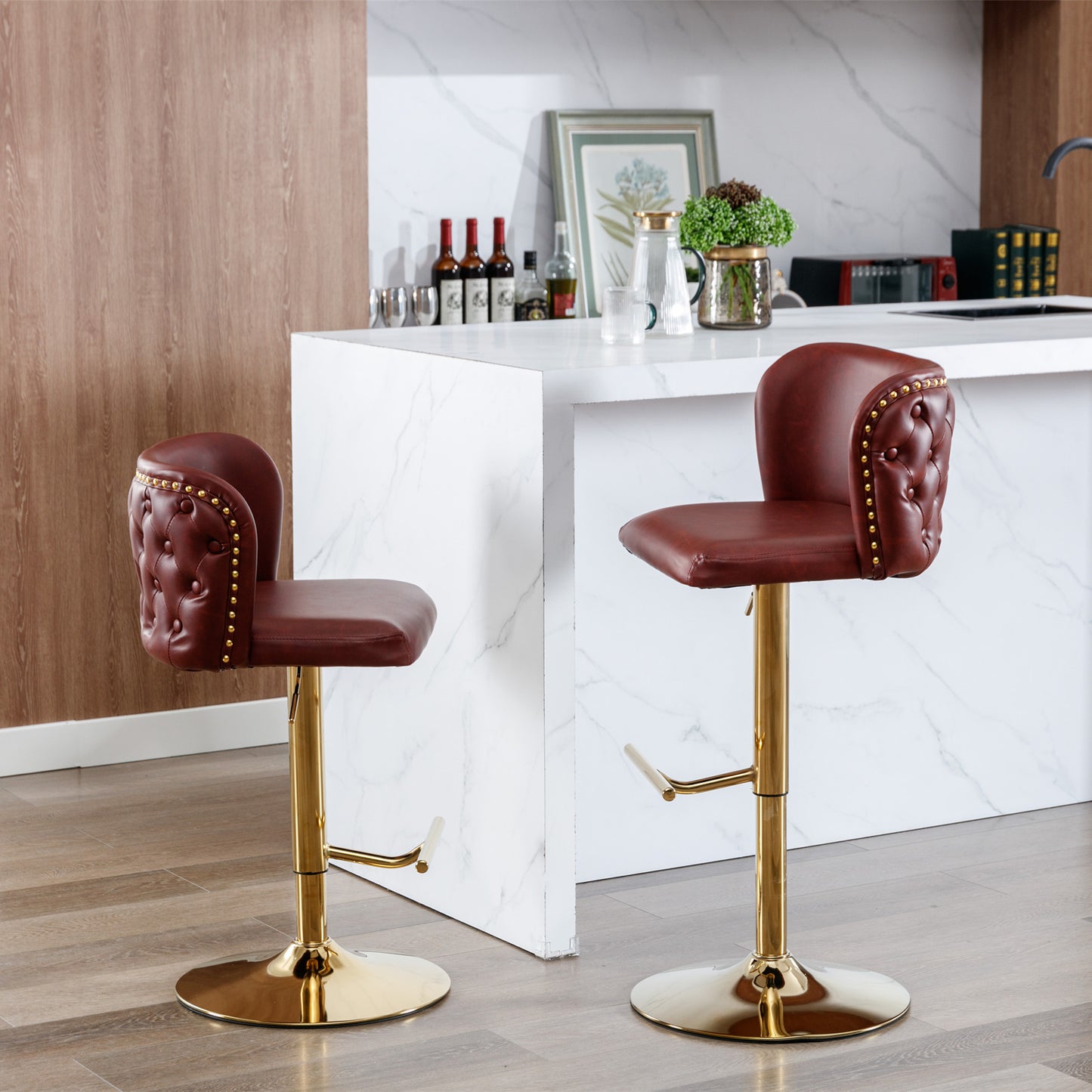 Tufted burgundy leather bar stool with gold accents and a golden base