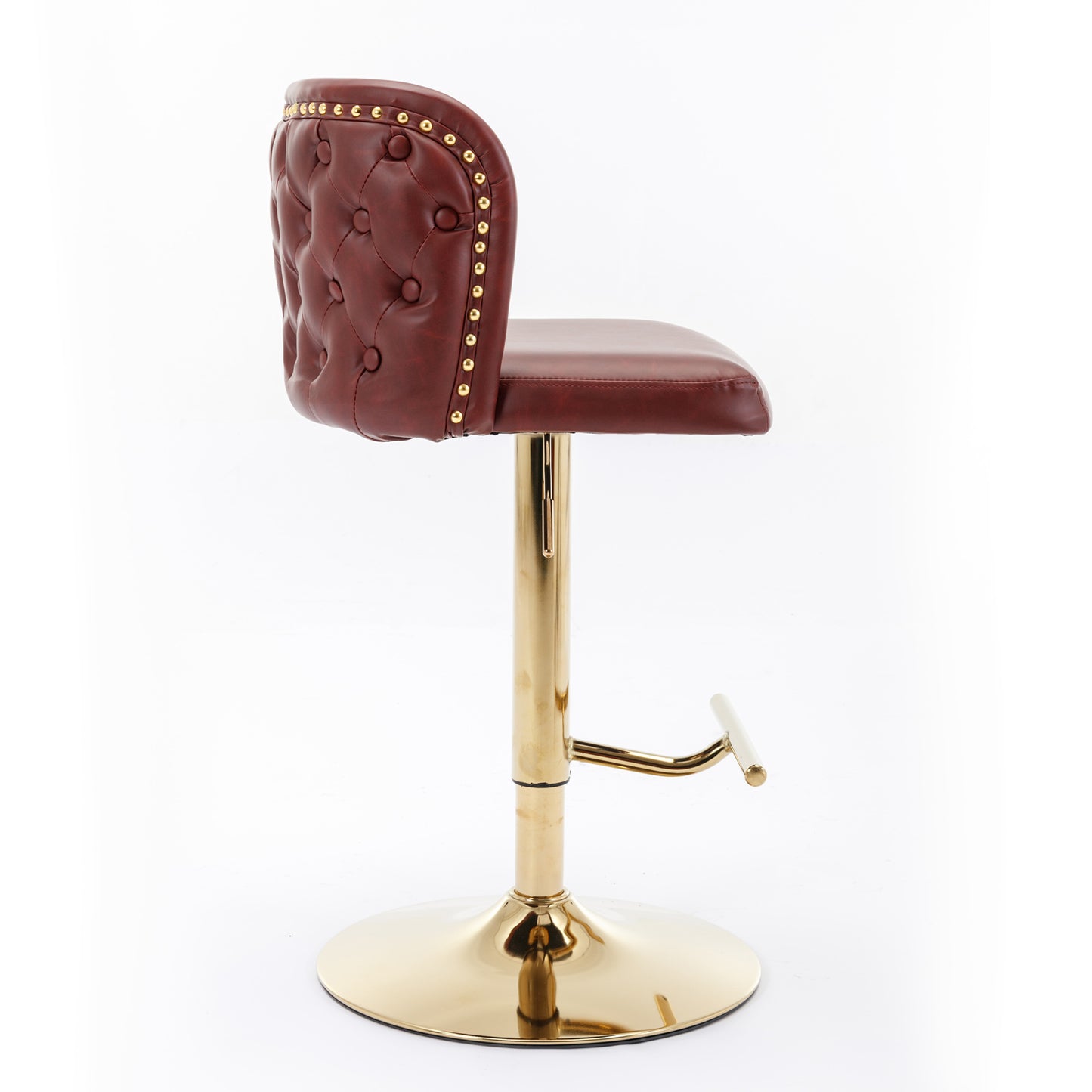 Tufted burgundy faux leather bar stool with gold studded trim and a polished gold base