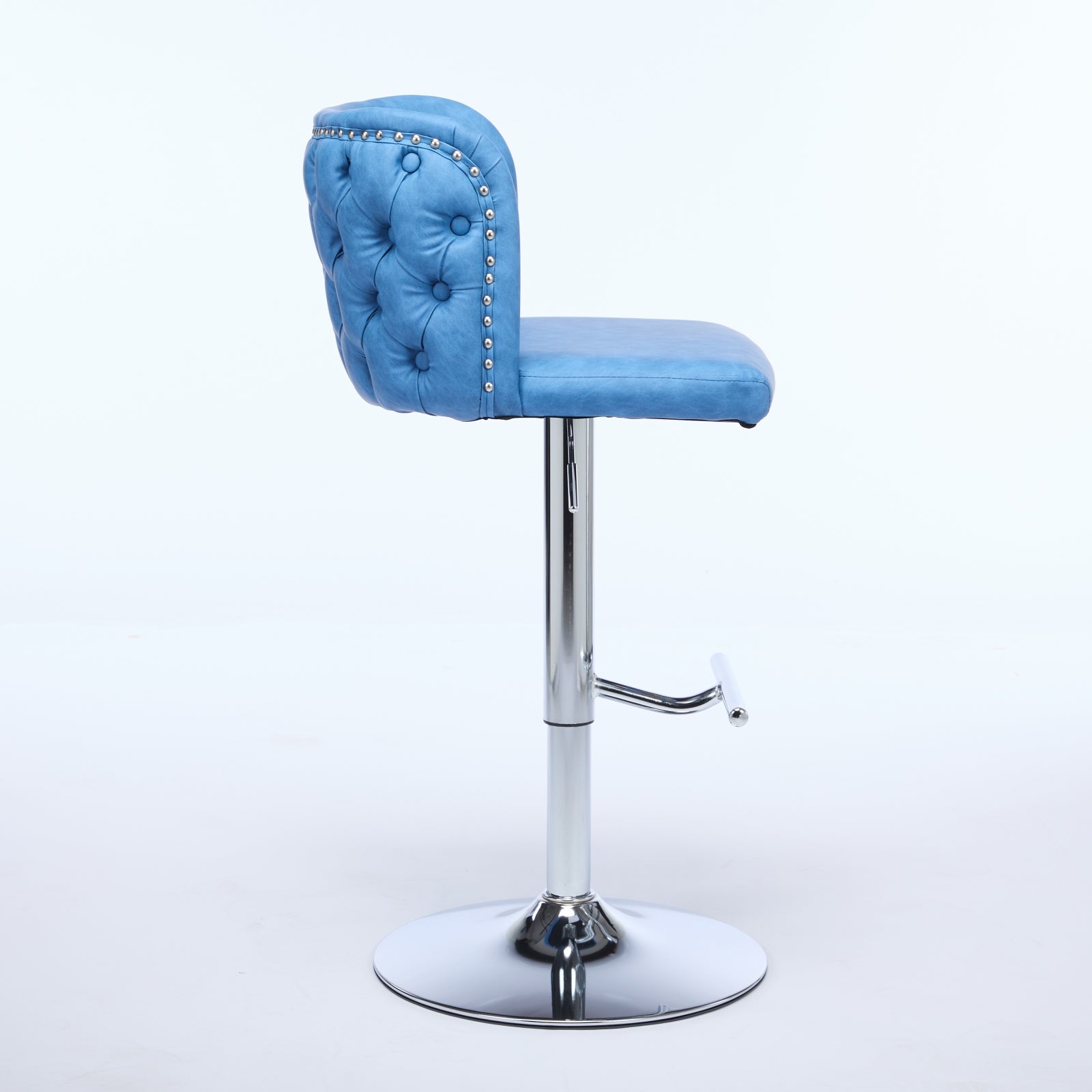 Blue tufted upholstered bar stool with chrome base and footrest