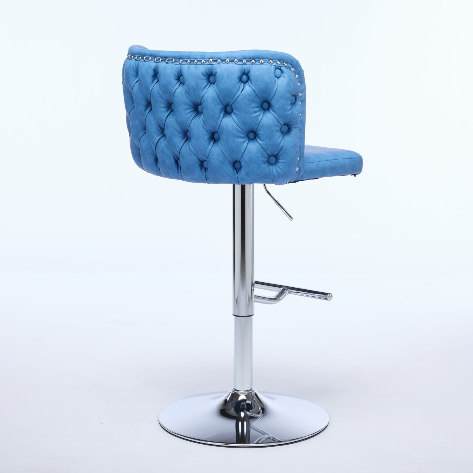 Blue tufted velvet bar stool with chrome base and adjustable height