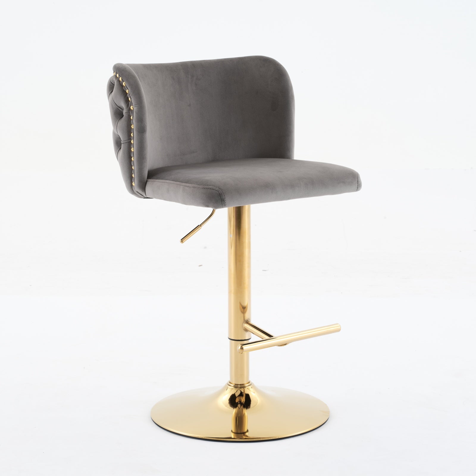 Grey velvet bar stool with tufted back and gold pedestal base