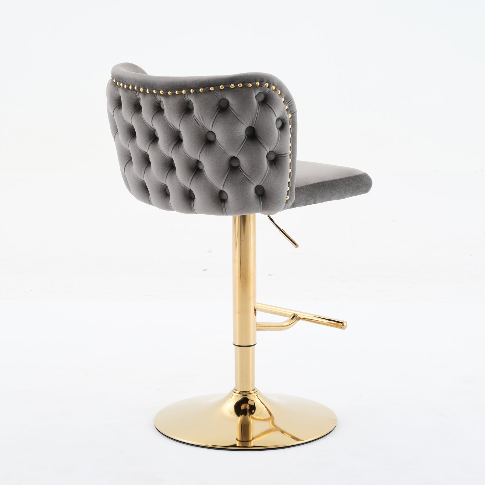 Gray velvet bar stool with tufted back and gold base