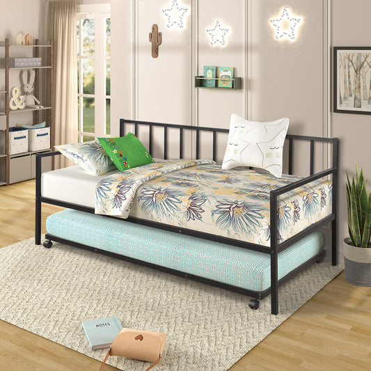 Black metal twin daybed with pullout trundle and floral bedding